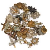 A GROUP OF MILITARY CAP BADGES