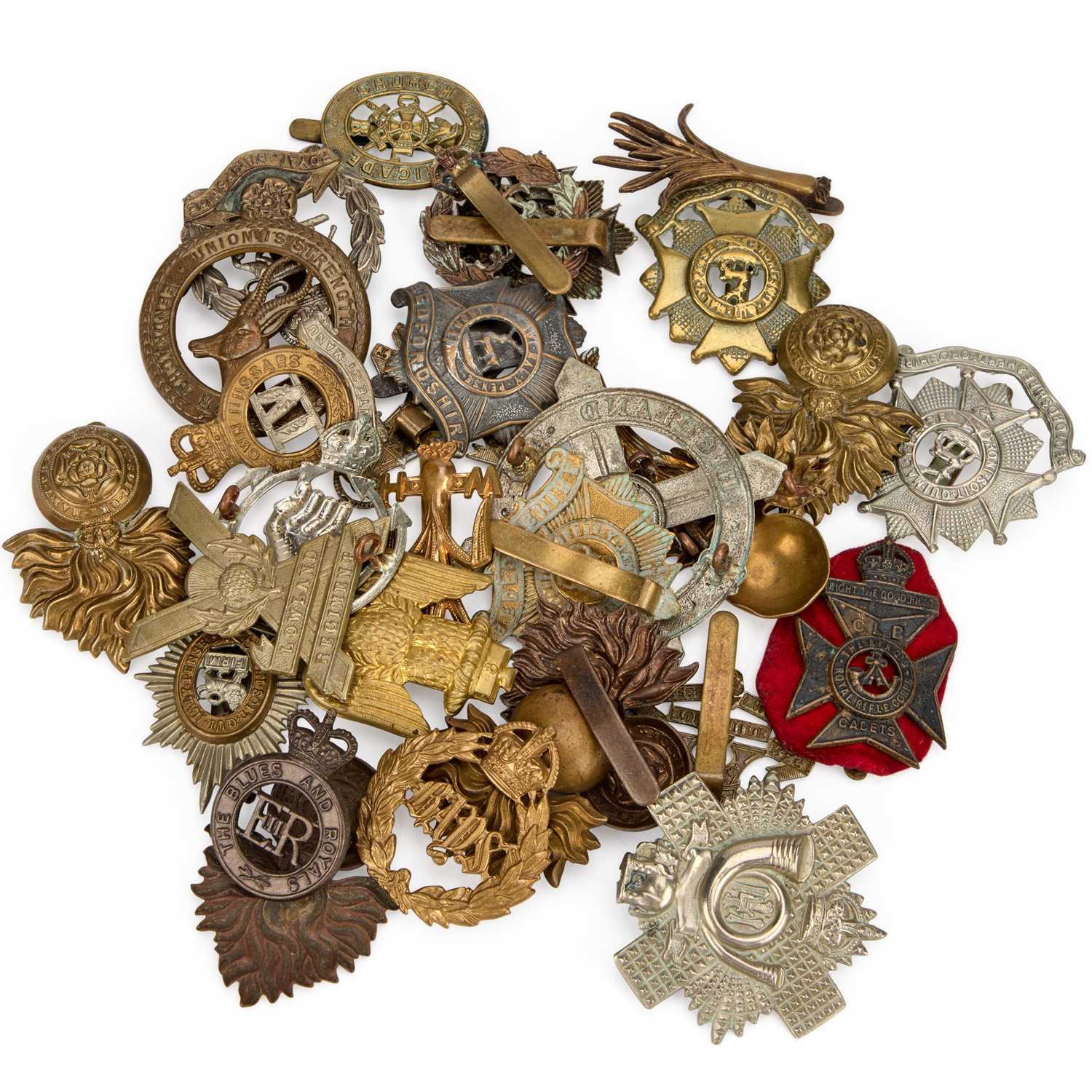A GROUP OF MILITARY CAP BADGES