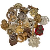 A GROUP OF MILITARY CAP BADGES