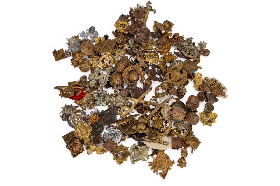 A GROUP OF COLLAR BADGES