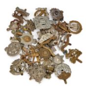 A GROUP OF MILITARY CAP BADGES