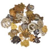 A GROUP OF RE-STRIKED CAP BADGES