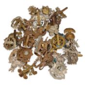 A GROUP OF MILITARY CAP BADGES