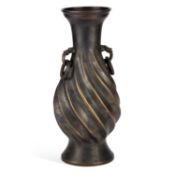 A LARGE BRONZE VASE IN THE ARCHAIC STYLE