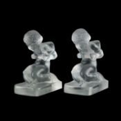 RENÉ LALIQUE (FRENCH, 1860-1945) A PAIR OF 'AMOUR' BOOKENDS, DESIGNED 1929
