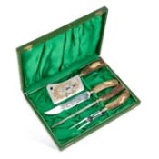 A KLAUS TRAGBAR GERMANY FOUR-PIECE CARVING SET