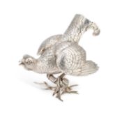 A GERMAN CAST SILVER MODEL OF A CAPERCAILLIE