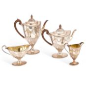 A VICTORIAN SILVER-PLATED FOUR-PIECE TEA SERVICE