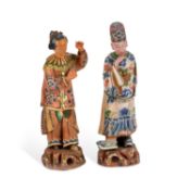 A PAIR OF CHINESE POLYCHROME-DECORATED TERRACOTTA FIGURES CIRCA 1820