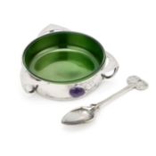 ARCHIBALD KNOX (1864-1933) FOR LIBERTY & CO A TUDRIC PEWTER AND ENAMEL PRESERVE DISH AND SPOON