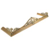 A LATE VICTORIAN BRASS FENDER