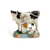 A YORKSHIRE PRATT WARE COW GROUP CIRCA 1830