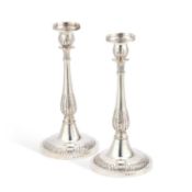 A PAIR OF RUSSIAN SILVER CANDLESTICKS