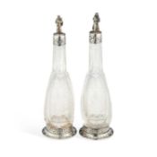 A PAIR OF GERMAN STERLING SILVER MOUNTED LIQUER DECANTERS