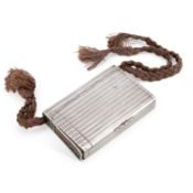 AN EARLY 20TH CENTURY RUSSIAN SILVER COMBINATION CIGARETTE AND VESTA CASE