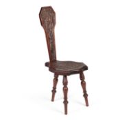 A LATE VICTORIAN CARVED WALNUT SPINNING CHAIR