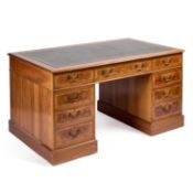 A GEORGIAN STYLE WALNUT PEDESTAL DESK