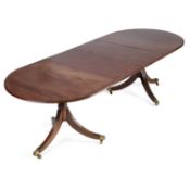 A REGENCY STYLE MAHOGANY TWIN-PEDESTAL DINING TABLE 20TH CENTURY