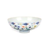 A CHINESE UNDERGLAZE BLUE AND IRON-RED 'DRAGON AND PHOENIX' BOWL