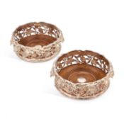 A PAIR OF SILVER-PLATED COASTERS