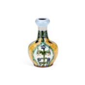 CARLO MANZONI (1855-1910) AN ARTS AND CRAFTS POTTERY BOTTLE VASE