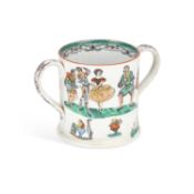 A LARGE 19TH CENTURY STAFFORDSHIRE POTTERY 'HARLEQUIN' LOVING CUP