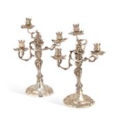 A PAIR OF 18TH CENTURY GERMAN SILVER THREE-LIGHT CANDELABRA