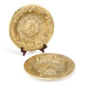 A PAIR OF GERMAN SILVER-GILT SIDEBOARD DISHES OR CHARGERS