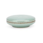 A CHINESE CELADON BOX AND COVER
