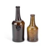 AN EARLY WINE BOTTLE AND A 19TH CENTURY WINE BOTTLE