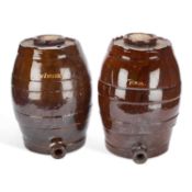 A PAIR OF 19TH CENTURY SLIPWARE SPIRIT BARRELS