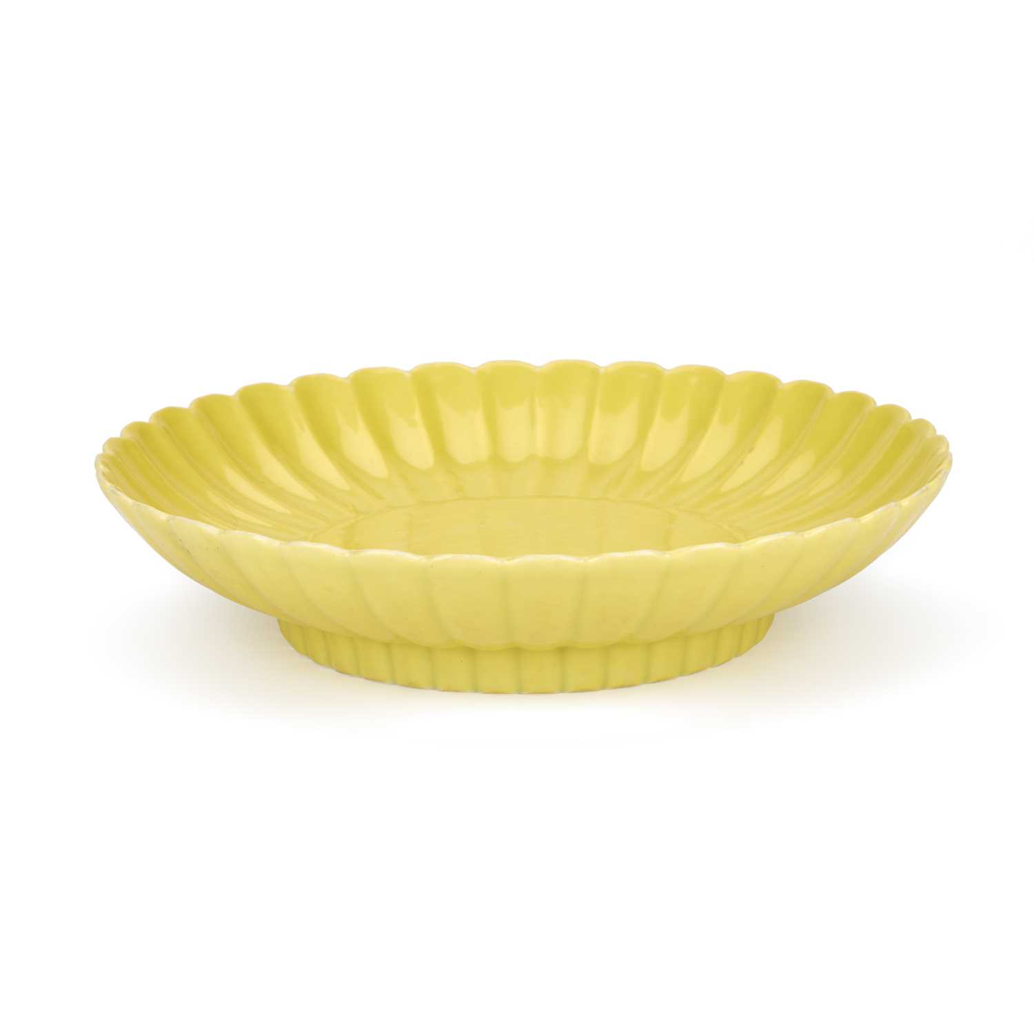 A CHINESE YELLOW-GLAZED PORCELAIN ‘CHRYSANTHEMUM’ DISH