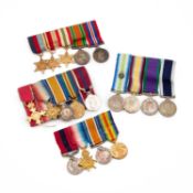 A COLLECTION OF MOUNTED MINIATURE MEDAL GROUPS
