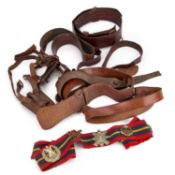 A GROUP OF MILITARY BELTS