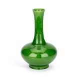 A CHINESE APPLE GREEN-GLAZED BOTTLE VASE