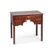 A GEORGE III OAK LOWBOY