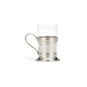 AN ARTS AND CRAFTS SILVER TEA GLASS HOLDER