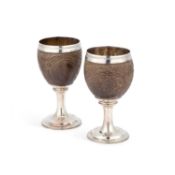 A PAIR OF GEORGE III SILVER-MOUNTED COCONUT CUPS