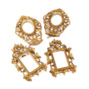 TWO PAIRS OF FLORENTINE CARVED GILTWOOD FRAMES