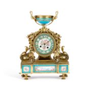 A 19TH CENTURY FRENCH PORCELAIN-MOUNTED BRASS MANTEL CLOCK
