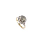 A FANCY YELLOW ROSE-CUT DIAMOND CLUSTER RING
