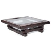 A LARGE JARABOSKY GLASS-TOPPED HARDWOOD COFFEE TABLE