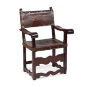 A SPANISH WALNUT ARMCHAIR IN 17TH CENTURY STYLE