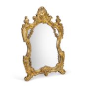 AN 18TH CENTURY GERMAN ROCOCO SILVER-GILT DRESSING TABLE MIRROR