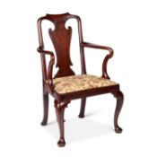 A GEORGE I STYLE RED WALNUT OPEN ARMCHAIR