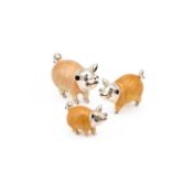 A SET OF THREE ITALIAN SILVER AND ENAMEL MODELS OF PIGS