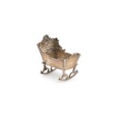 A CONTINENTAL SILVER MODEL OF A CRADLE