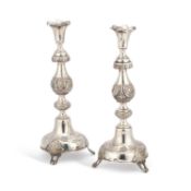 A PAIR OF RUSSIAN SILVER SABBATH CANDLESTICKS