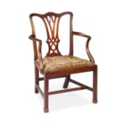 A GEORGE III MAHOGANY OPEN ARMCHAIR