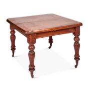 A VICTORIAN MAHOGANY DINING TABLE